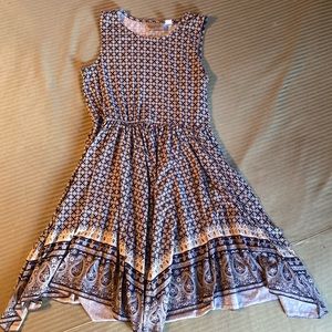 Handkerchief Hem, Micro Print blue and white print dress.  No sleeves.